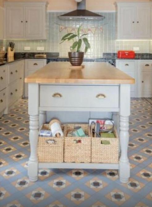 Before - Old kitchen island with patterned tile floor
