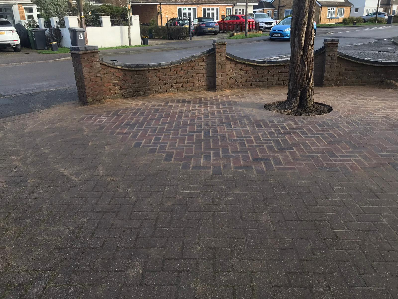 Completed new brick boundary wall with paving
